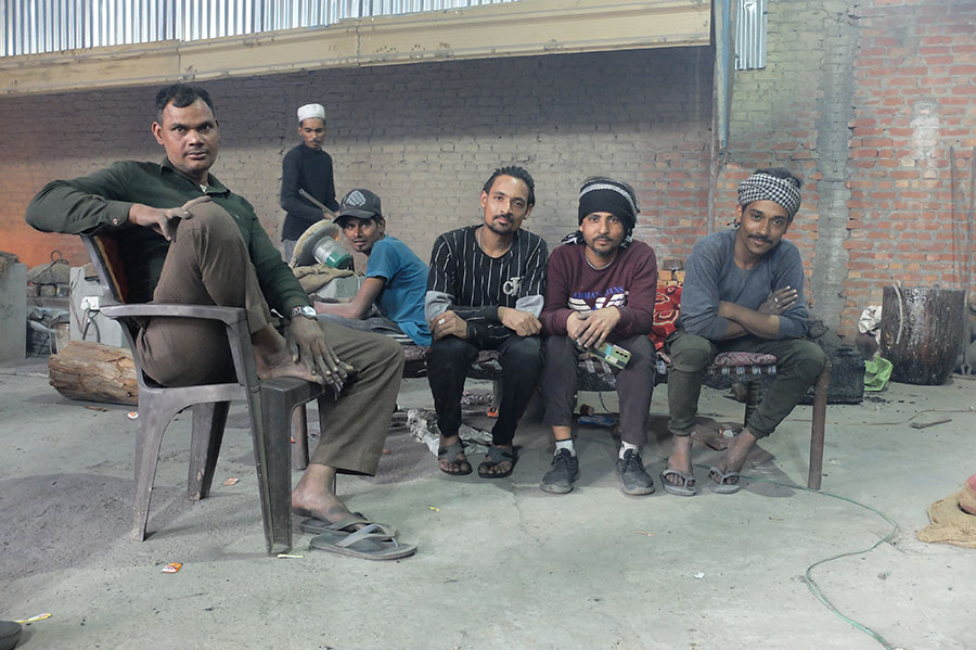 Hard-working individuals from India's labor class process e-waste